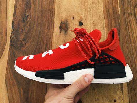 fake nmd online human race pharrell williams with adidas logo|adidas nmd human race price.